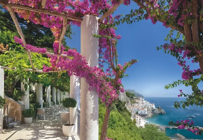 fotomural Amalfi azul, verde y rosa de Komar – 611027