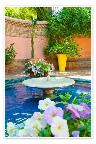 Fountain and flowers in the Majorelle Gardens (Gardens of Yves Saint-Laurent), Marrakech, Morocco, N de Matthew Williams-Ellis Robert Harding