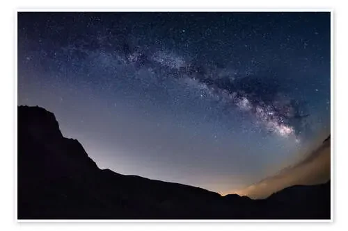 Milky Way arch and starry sky at high altitude in summertime on the Alps de Fabio Lamanna